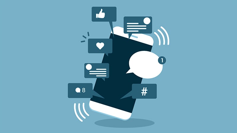 Schematische Darstellung eines Smartphones mit Social Media Interaktionen